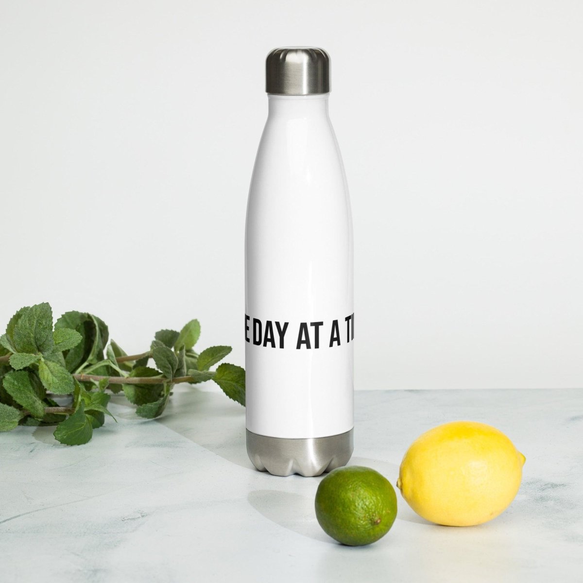 https://cleansober.co/cdn/shop/products/stay-hydrated-with-style-white-stainless-steel-water-bottle-with-one-day-at-a-time-design-the-perfect-gift-for-those-in-recovery-or-embracing-sobriety-105697.jpg?v=1690830540&width=1445